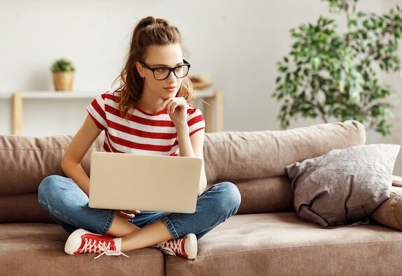 Female student working on laptop