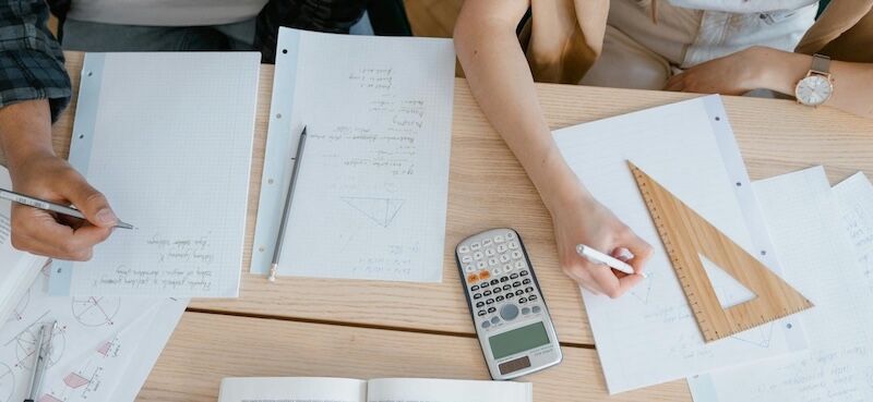 Students Working with Calculator