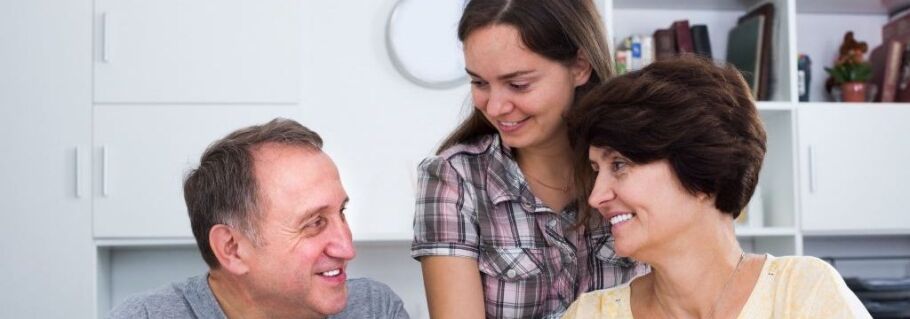 Family discusses college options and future academic success together at home.