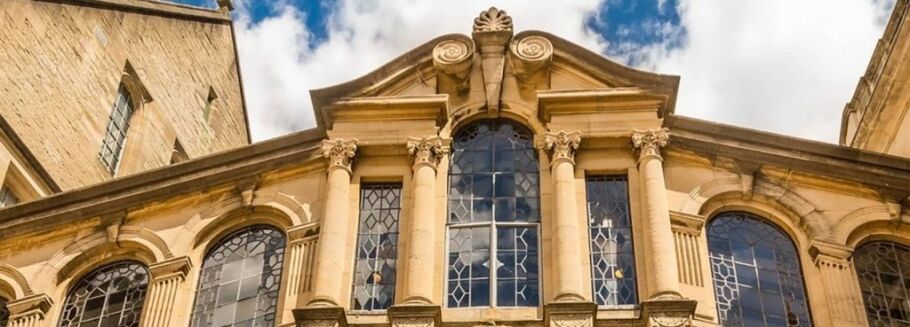 Architectural detail of a classic university building, symbolizing academic excellence.