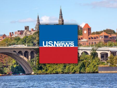 U.S. News logo over Georgetown University Campus as seen over the Potomac River.